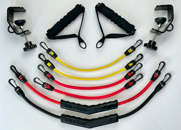 A collection of multicolored resistance bands and attachments laid out on a white background, with bands in red, yellow, and black colors, along with black straps and metal hooks.